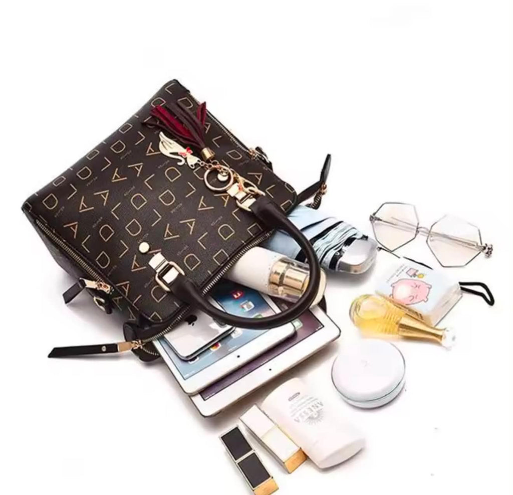 Luxury Monogram Handbag with Tassel Charm
