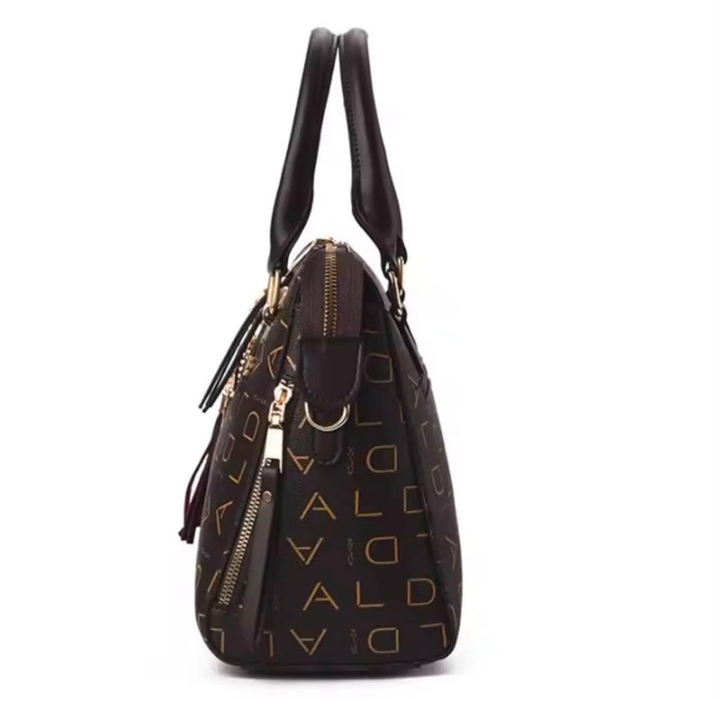 Luxury Monogram Handbag with Tassel Charm