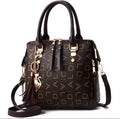 Luxury Monogram Handbag with Tassel Charm